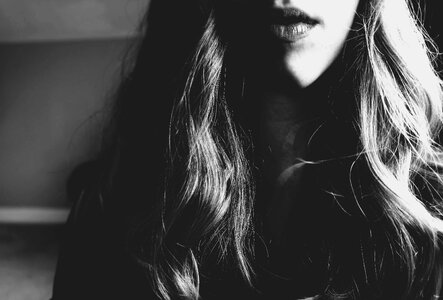 Woman gray hair gray lips