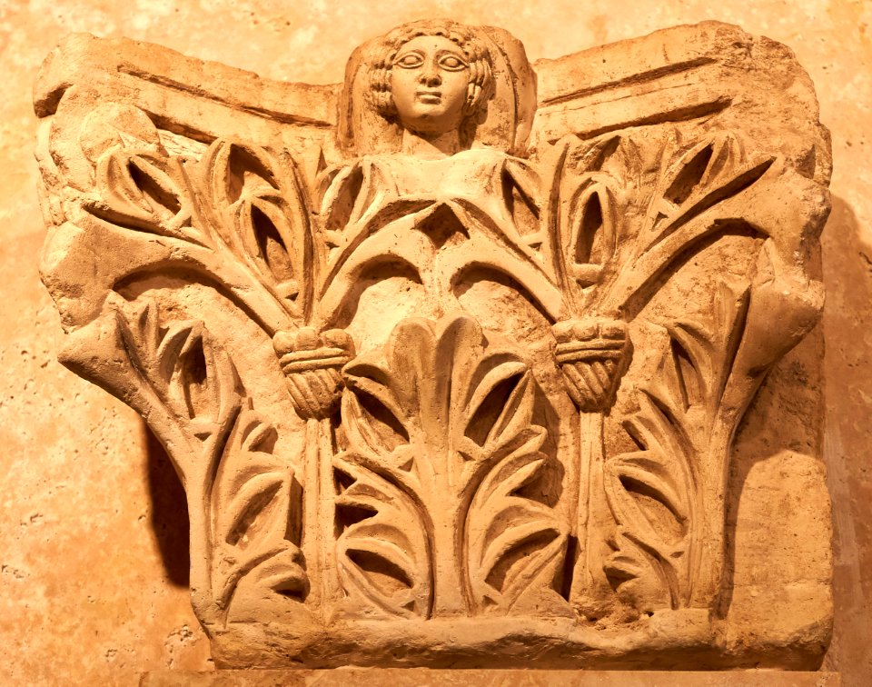 Limestone pilaster capital with relief bust. 5th cent. A.D