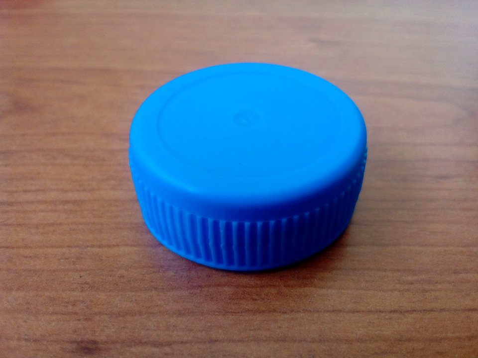 Light blue plastic bottle lid