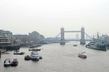 Rainy gray boat gray bridge