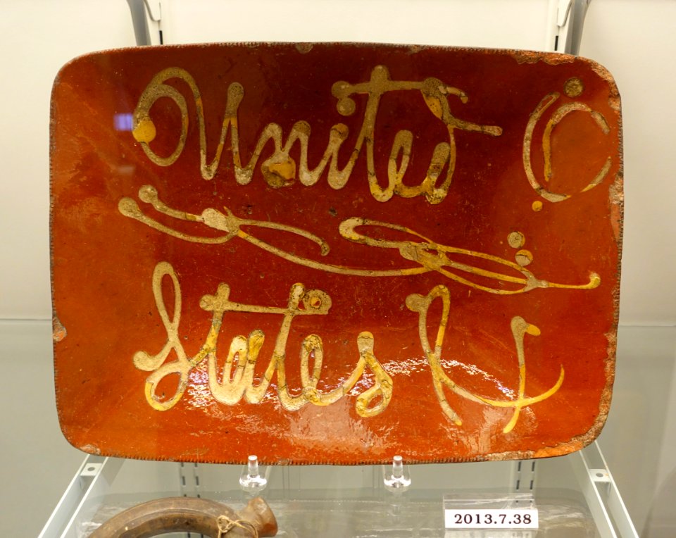 Loaf dish, probably New Jersey or Pennsylvania, c. 1840, lead-glazed redware, white slip, item HD 2013.7.38 - Flynt Center of Early New England Life - Deerfield, Massachusetts - DSC04067