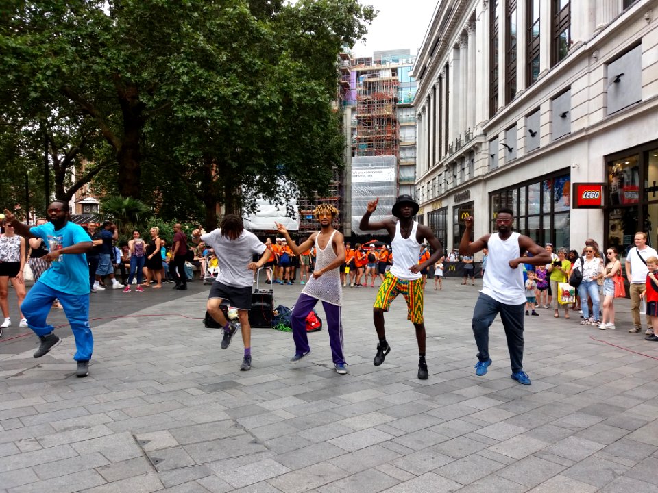 London - Leicester Square, street performers dancing on Gangnam Style song