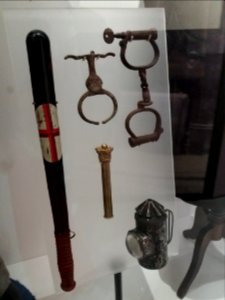 London - City of London Police Museum, truncheon, handcuffs, tipstaff and bullseye lamp