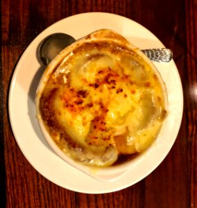 Longhorn Onion Soup with Bread slice in it photo