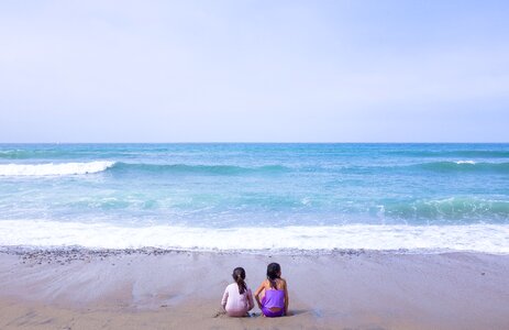 Water children playing blue beach photo