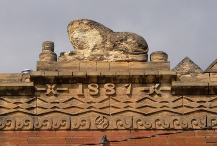 Lion Block (Ness City KS), lion crest 1