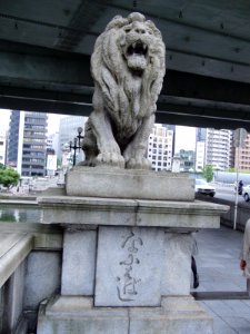 Lion statue before Naniwabashi Bridge