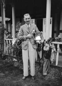 Man holding the Llandrindod Wells Visitors trophy (1293935)