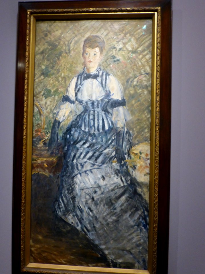 Manet - femme en robe à rayures