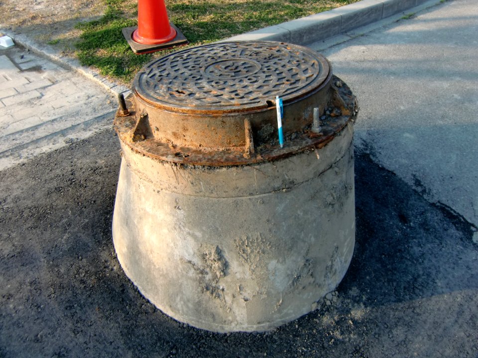 Manhole shows subsidence occurred by 2011 Sendai earthquake