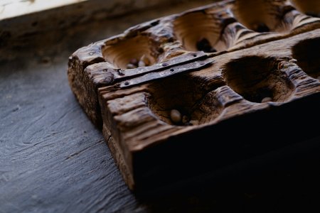 Mancala board at an Ezidi home in June of 2019 in Wardia village near Shingal town 03