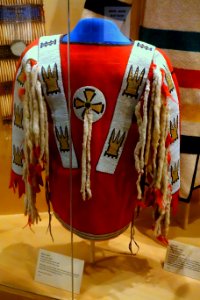Man's shirt, Siksika, mid 1800s, wood, glass beads, weasel tails - Glenbow Museum - DSC01067 photo