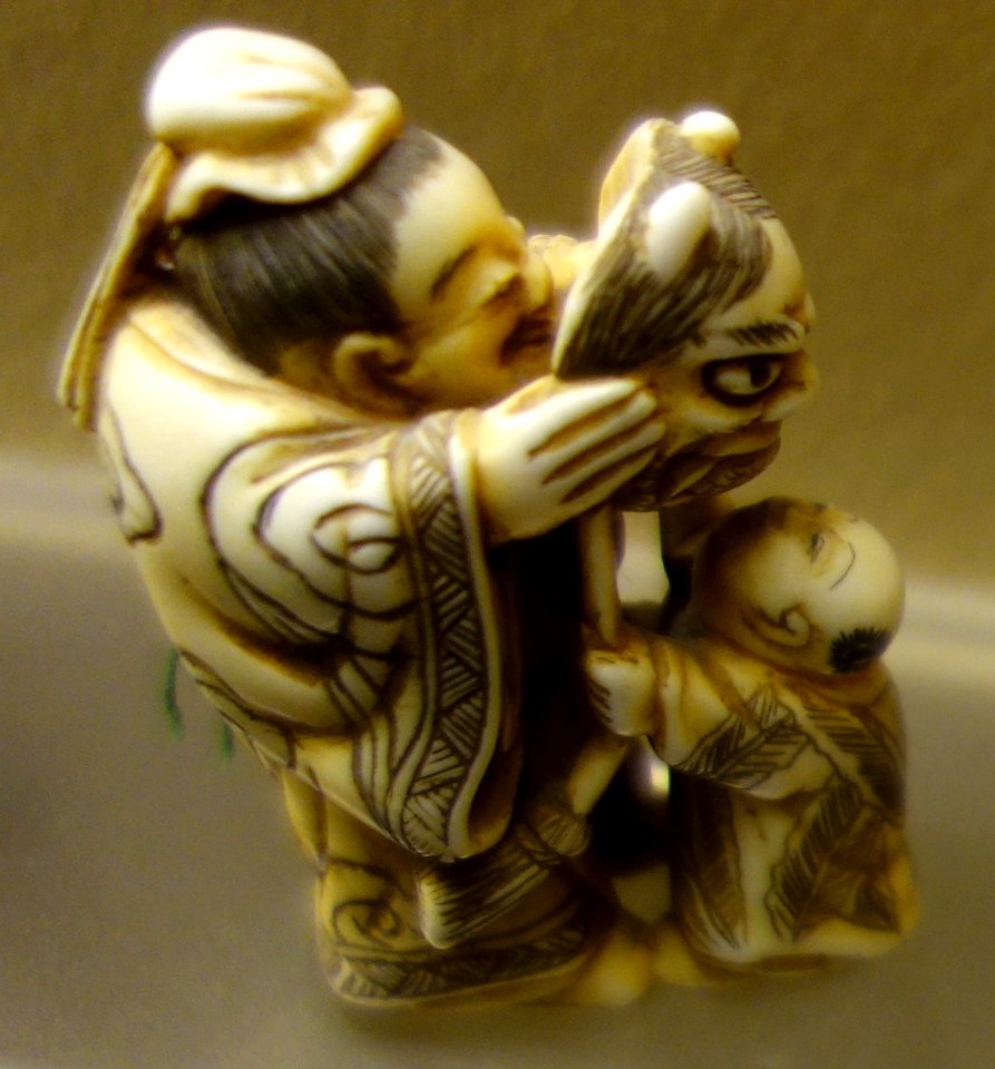 Man and child with mask netsuke - Fairbanks Museum and Planetarium - DSC04355