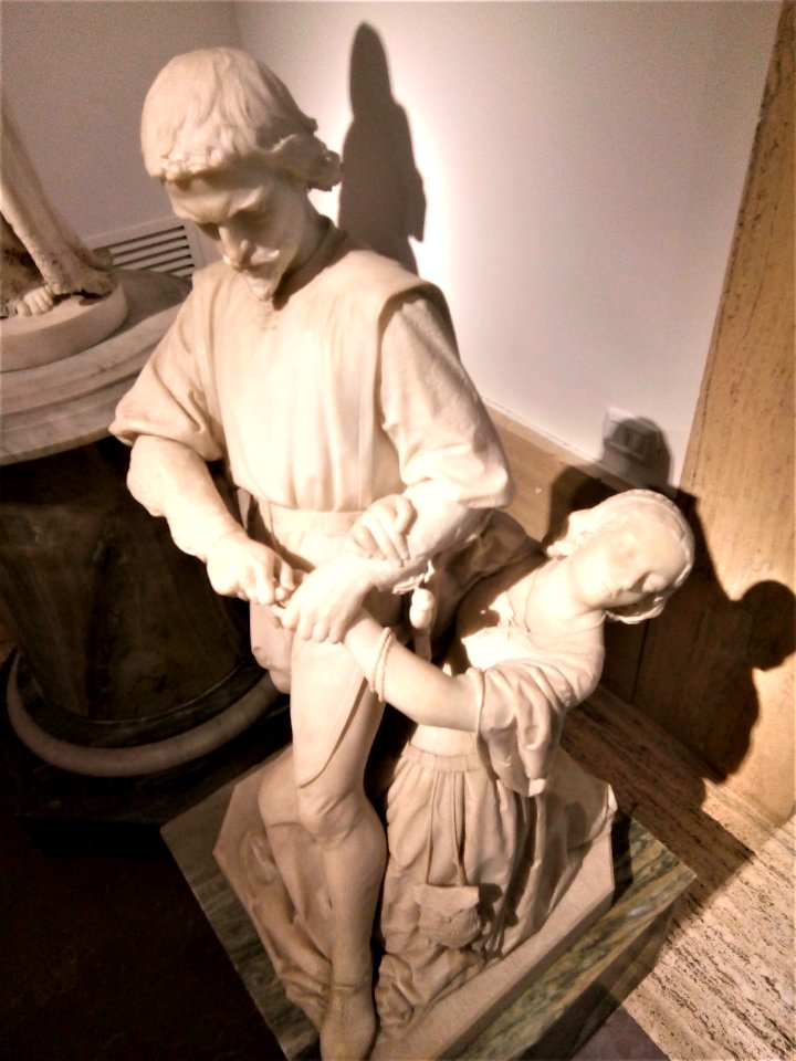 Man stealing wife's ring, statue Italy
