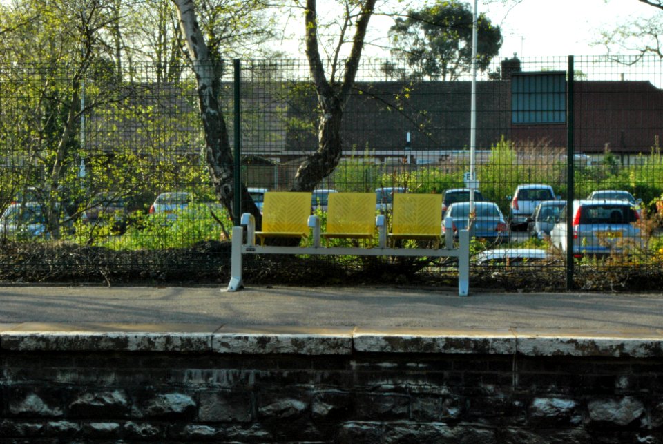 Maghull Station Sign with Car Park behind