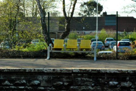 Maghull Station Sign with Car Park behind