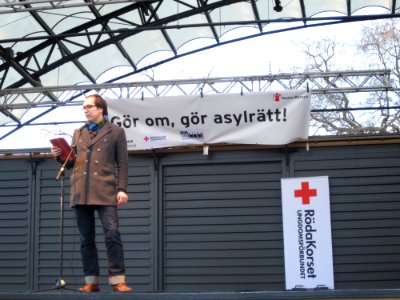 Magnus Nilsson from S-studenter at demonstration against Swedish migration policy in Stockholm