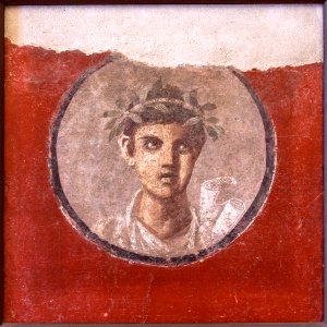 MANNapoli 120620 a Fresco young man with rolls from Pompeii Italy photo