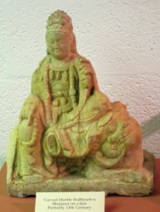 Marble sculpture of Manjusri on a lion, probably 13th century, Lyman House Memorial Museum
