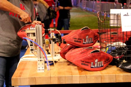 Manufacturing footballs at the Super Bowl Experience at Super Bowl LIII, Jan 2019