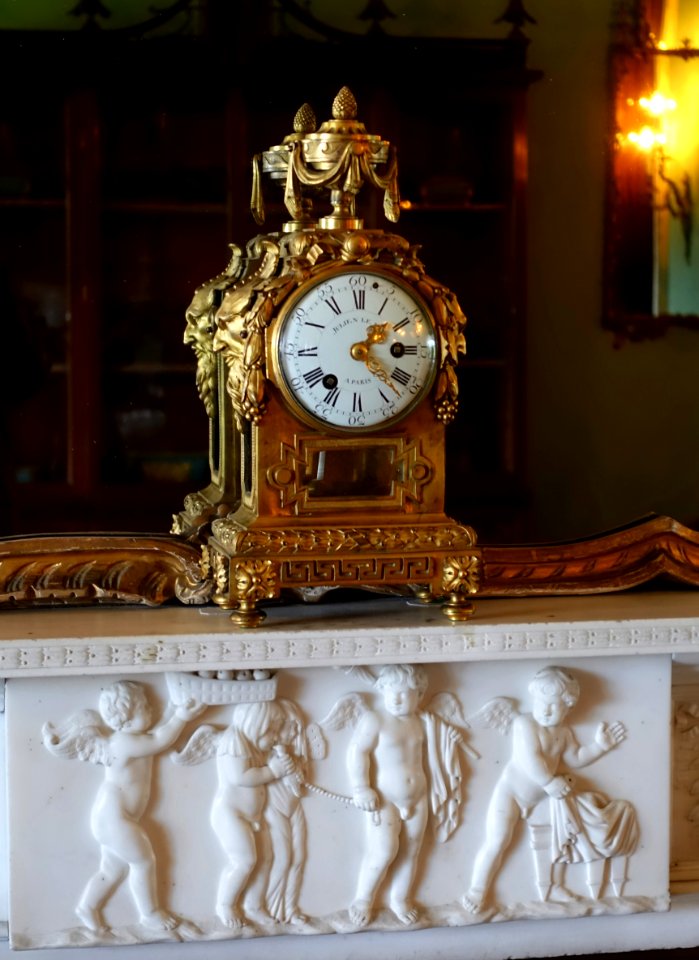 Mantel clock by Julien Le Roy, 1790, glass, ormolu, vitreous enamel, on chimneypiece by John Devall the younger, 1793, marble - Blue Drawing Room - Shugborough Hall - Staffordshire, England - DSC00336