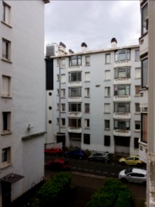 Lyon 8e - Musée urbain Tony Garnier, rue des Serpollières depuis l'appartement témoin