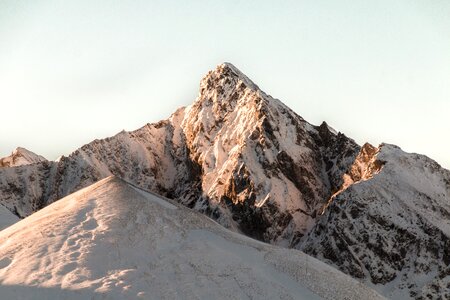 Winter snow mountain peak photo