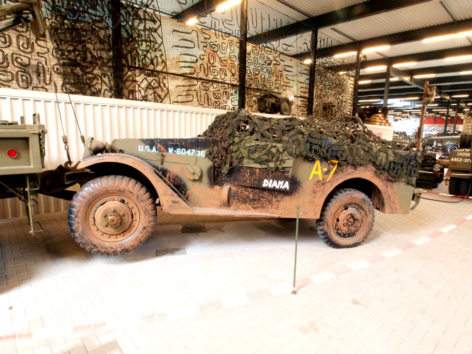 M3A1 Scout Car towed by a recovery truck pic1