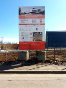 Lyon 7e - Rue Saint-Jean de Dieu, panneau Construction de la chaufferie bois
