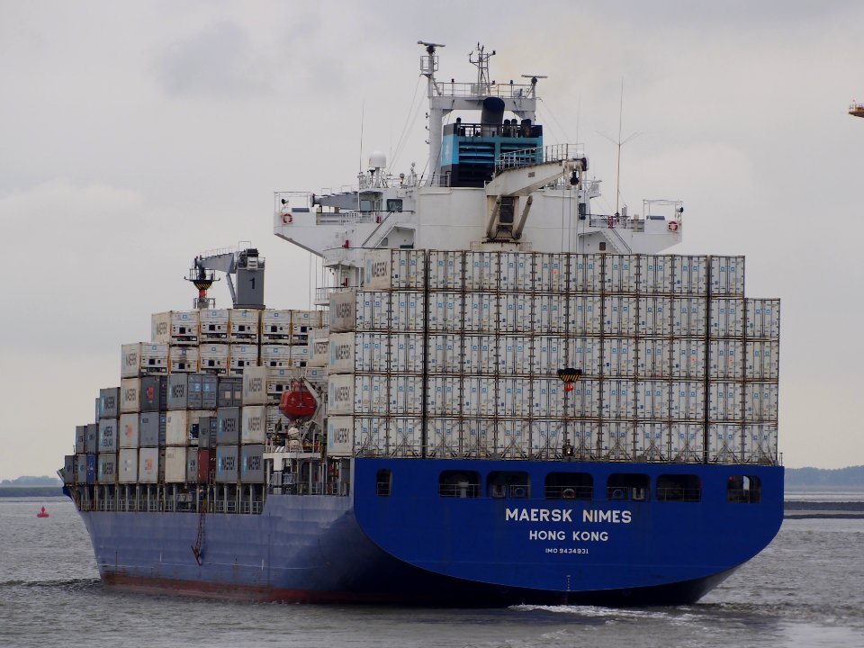 Maersk Nimes - IMO 9434931, leaving Port of Antwerp
