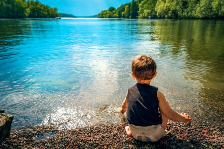 Water playing toddler
