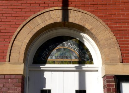 Madison, Nebraska First Presbyterian lunette window over S entrance
