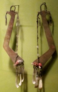 Men's ear pendants (batling) from Ilongot in northern Luzon, hornbill, brass, shell and cotton, Honolulu