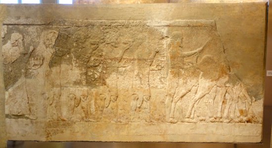 Men bearing bowls and city models, probably from Que (Cilicia) - Corridor 10 relief, Palace of Sargon II - Oriental Institute Museum, University of Chicago - DSC07582