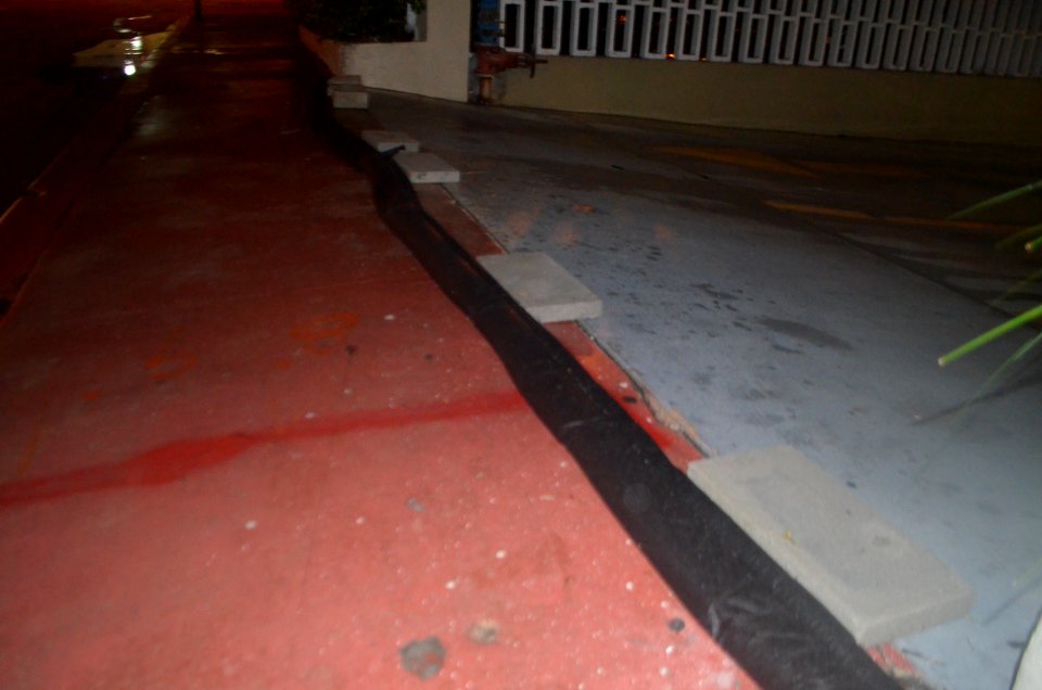 Miami Beach garage tidal flooding with rain at high tide during king tides 22