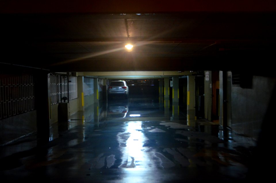 Miami Beach garage tidal flooding with rain at high tide during king tides 19