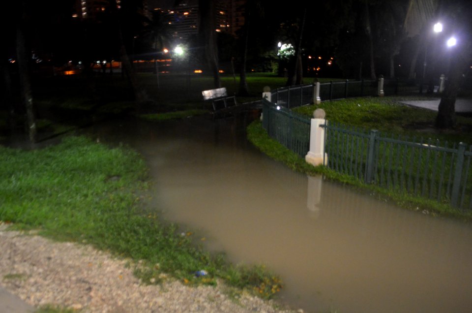 Miami Beach park tidal flooding with rain at high tide during king tides 20