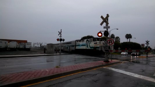 Metrolink Train in Santa Fe Springs California BNSF Tracks Rainy day