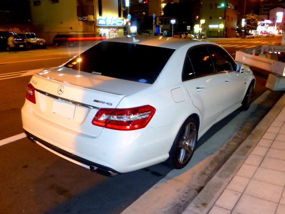 Mercedes-Benz E63 AMG (W212) at night rear