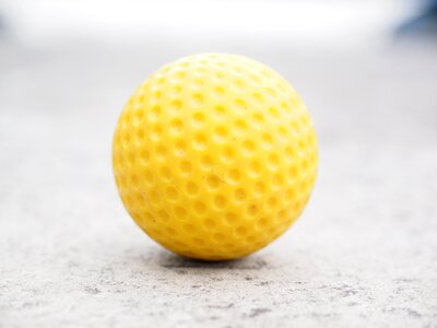Checkered ball guide miniature golf