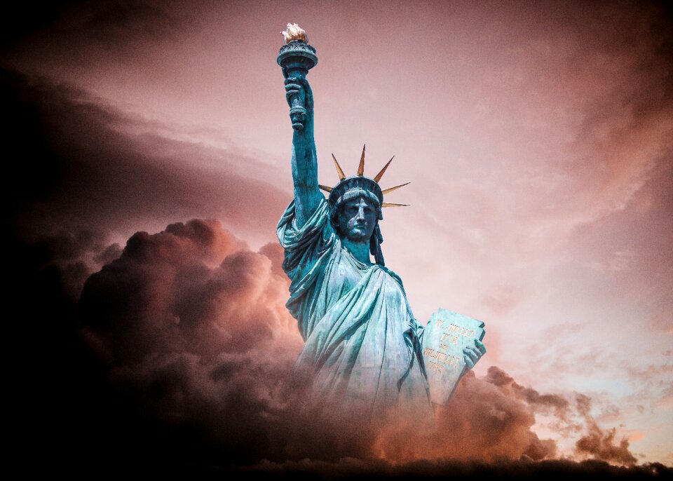 Clouds liberty enlightening the world torch