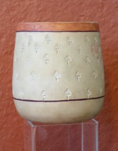 Meroitic bowl, largely restored, 500-400 BCE, thin metallic ware with cream slip and stamped design - Redpath Museum - McGill University - Montreal, Canada - DSC08124