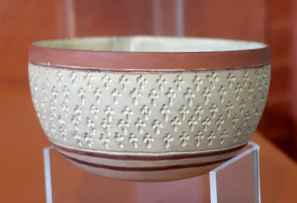 Meroitic bowl, largely restored, 500-400 BCE, thin metallic ware with cream slip and stamped design - Redpath Museum - McGill University - Montreal, Canada - DSC08125