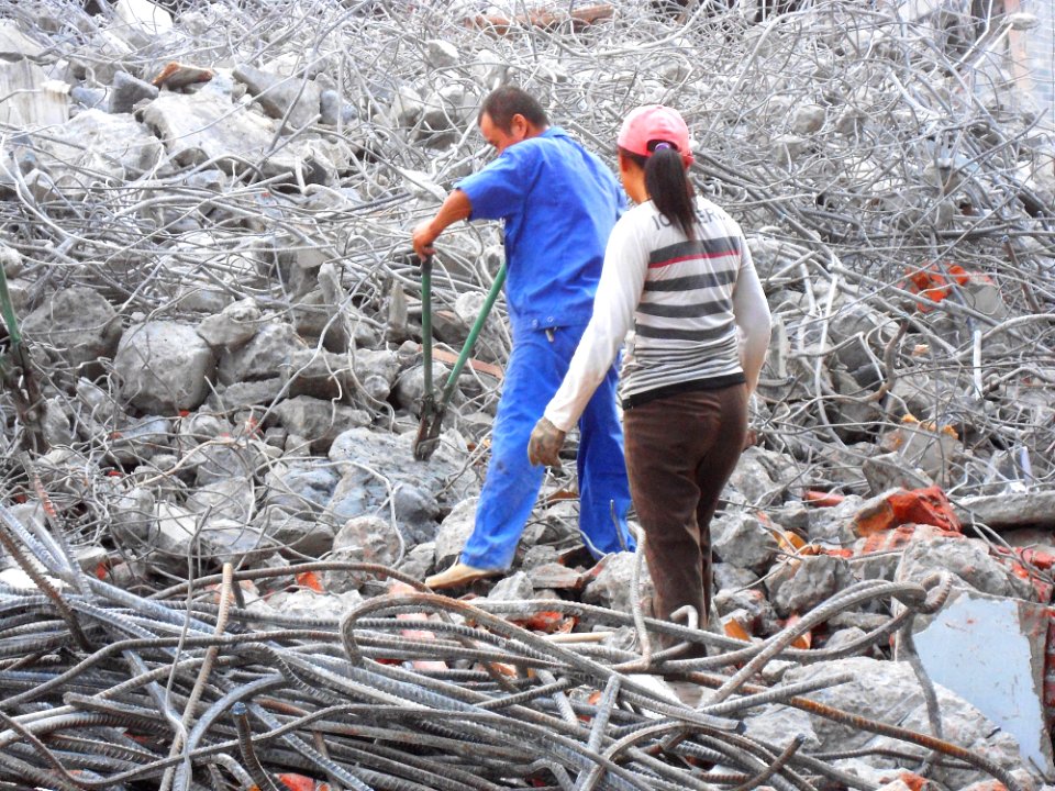 Metal rebar reclamation for recycling at building demolition site - 03