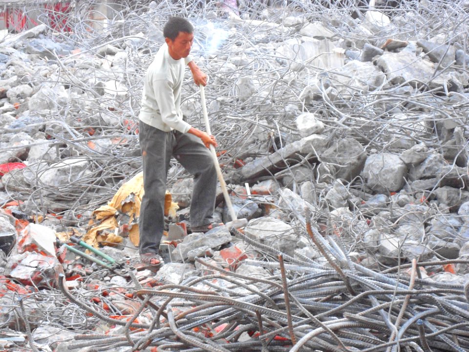 Metal rebar reclamation for recycling at building demolition site - 05
