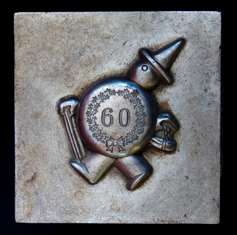 Metaal stempels met Droste mannetje 60 jarig jubileum, foto7