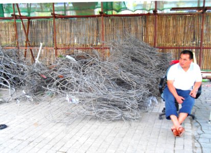 Metal rebar reclamation for recycling at building demolition site - 07