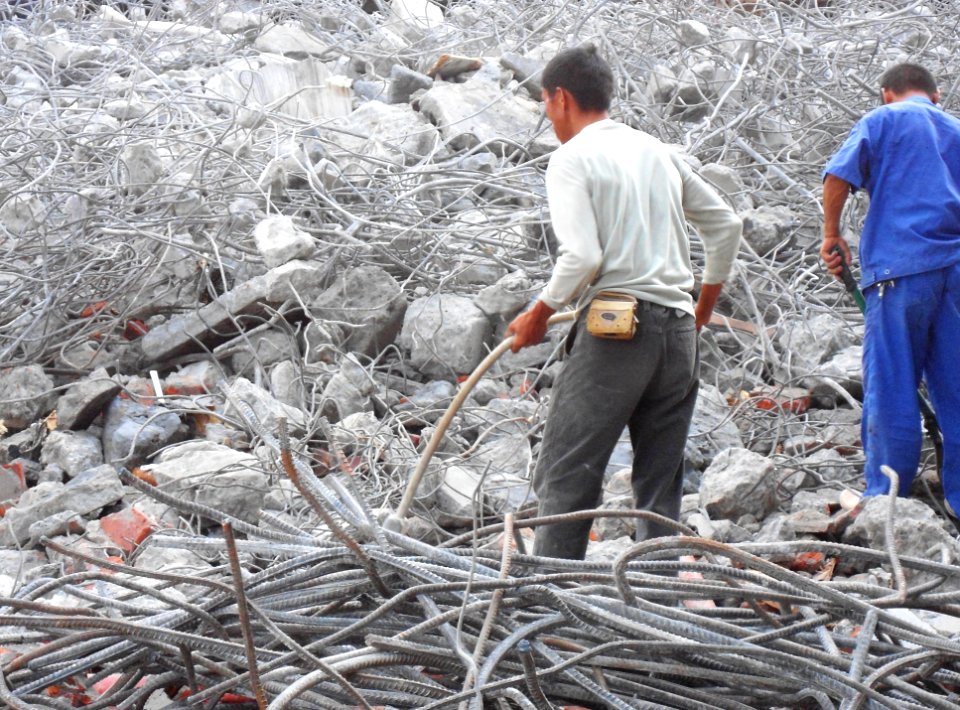 Metal rebar reclamation for recycling at building demolition site - 06