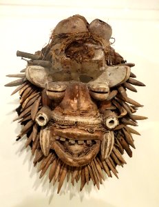 Mask (Von Gla), We people, Montagnes or Moyen-Cavally region, Cote d'Ivoire, early 20th century, wood, metal, fur, fiber, hair, leopard's teeth, warthog tusks, pigment - Brooklyn Museum - Brooklyn, NY - DSC08485