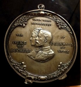 Medal commemorating visit of Duke and Duchess of Cornwall (later King George V and Queen Mary) to Siksika peoples near Calgary, 1901, view 2 - Glenbow Museum - DSC01093